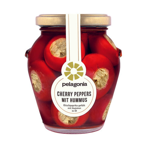 Cherry Peppers mit Hummus im Glas, mit Kichererbsen-Hummus gefüllte Kirschpaprika in Öl