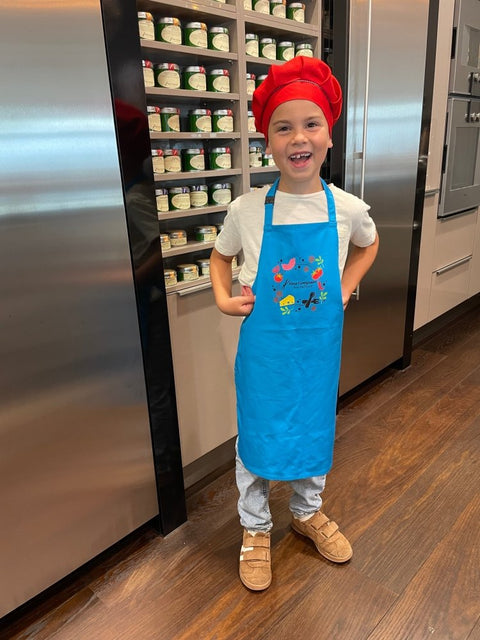 Children's apron turquoise worn – robust for cooking, baking and crafting
